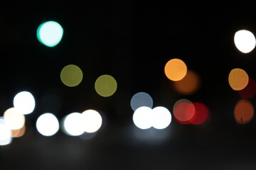 Abstract City Traffic Bokeh Background with Defocused Night Lights © Sam