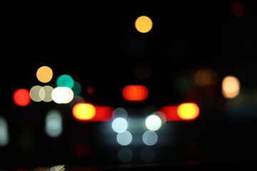 Abstract City Traffic Bokeh Background with Defocused Night Lights © Sam