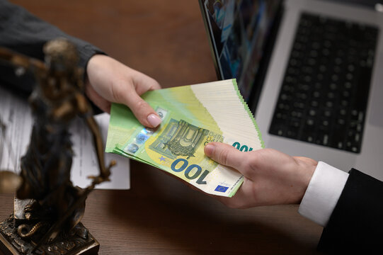 Close Up of Illegal Cash Payment During Bribery Transaction