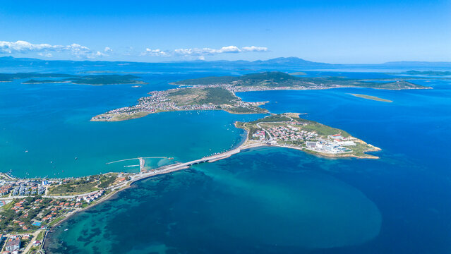 Panoramic aerial drone view of Cunda Alibey Island and the connecting bridge in Ayvalik Turkey