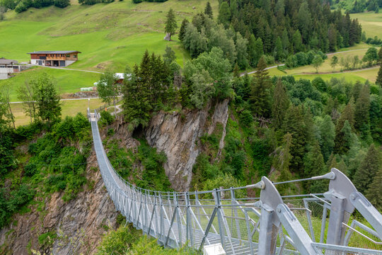 Suspension bridge spanning the rocky Isel gorge in East Tyrol