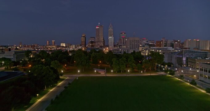 Indianapolis Indiana Aerial v22 low level fly through over military park towards downtown and the city late evening - 6k professional footage - August 2020