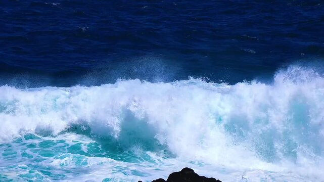 waves crashing on rocks