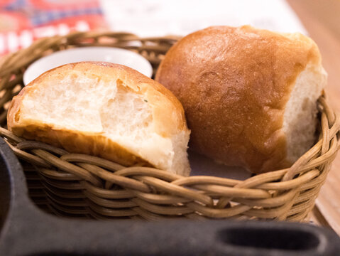 Freshly Baked Dinner Rolls in Woven Basket