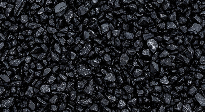 High Contrast Texture of Black Coal and Crushed Stone Pieces in a Raw Carbon Mineral Pile