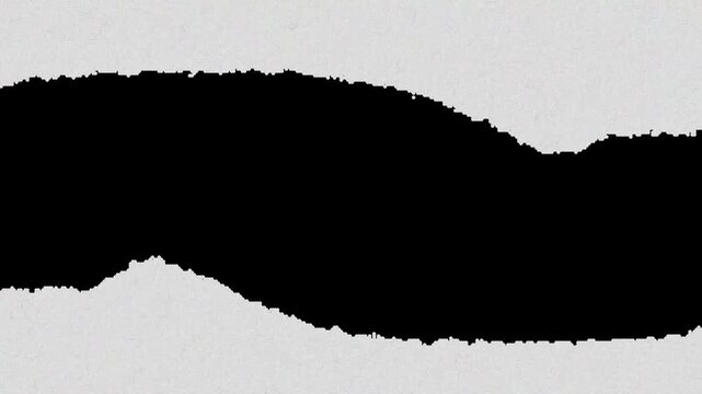 Horizontal torn paper edge reveal with solid black center section for creative projects
