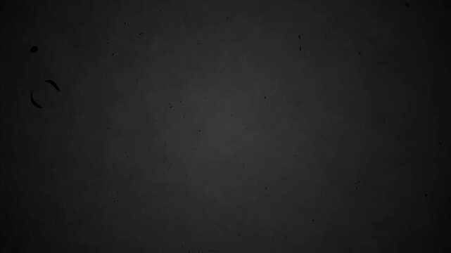 Dark grey grunge texture with subtle grain and dust particles for cinematic overlay effects