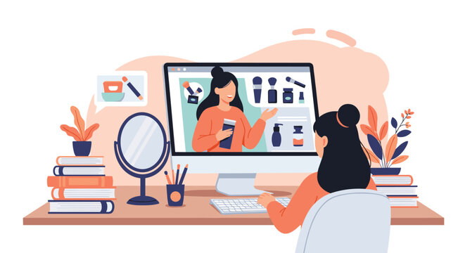 Young woman sits at her desk and watches a professional makeup tutorial on her computer to learn new beauty techniques and tips.