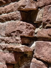 Fototapeta premium Germany 2026 ancient stone wall with mortar close-up in outdoor setting periodic