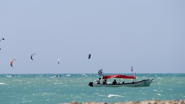 race committee boat at a kitesurfing event in mayapo guajira