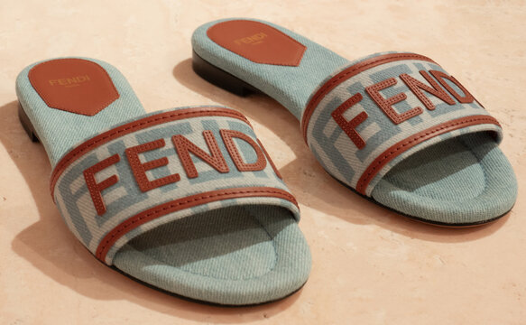 Fendi Sunshine mules in light blue jacquard with an FF pattern and a leather logo on the front. Milan &ndash; Italy, 4 July 2026