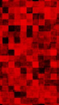 Abstract background with a dynamic grid of red and black flashing squares. Random geometric pattern creating a glitchy and chaotic effect