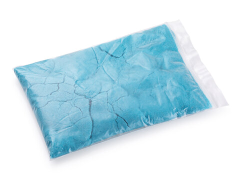 Bag of blue kinetic sand isolated on white background