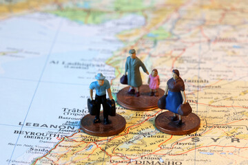 Fototapeta premium Miniature Refugees returning to their homes in Lebanon After Armed Conflict