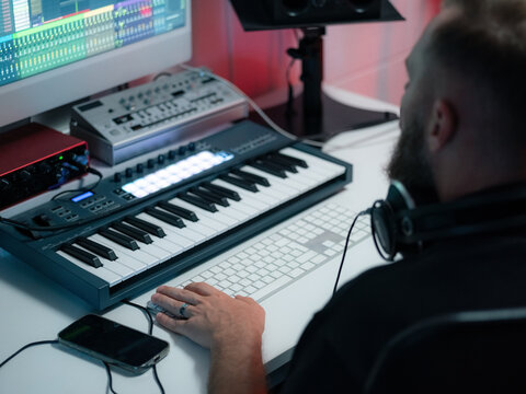 Man mastering sound at studio 