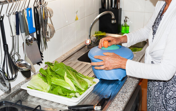 Preparing Lettuce With Salad Spinner