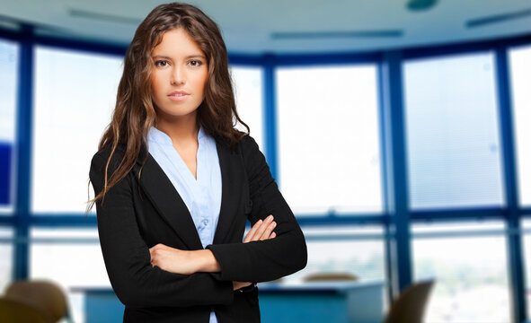 Confident businesswoman in modern office setting