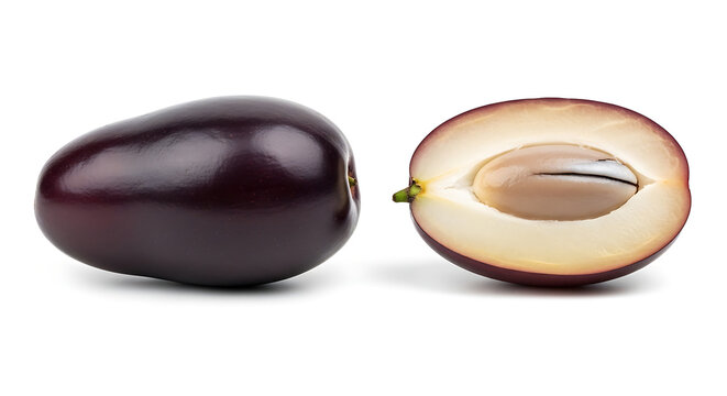 Fresh whole and halved jamun fruit. Purple java plum berry isolated. Healthy tropical organic food.