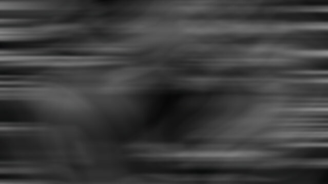Abstract monochrome motion blur background with soft horizontal streaks of grey and black tones creating a dynamic sense of speed and fluidity for modern graphic design with flowing streaky patterns