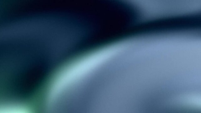 Grainy abstract gradient background with soft blue and green light