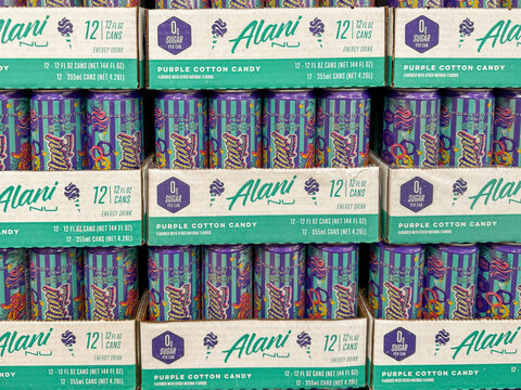Mesa, Arizona - June 27, 2026: Boxes of Alani brand purple cotton candy flavored energy drinks for sale