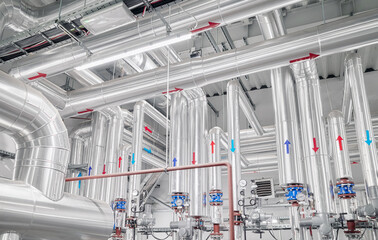 Piping in a district heating plant that uses renewable energy sources. © MaciejBledowski