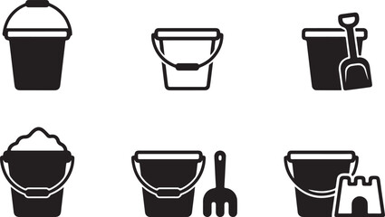 Black and white sand toys and bucket set with shovel and castle Vector © mahafuza