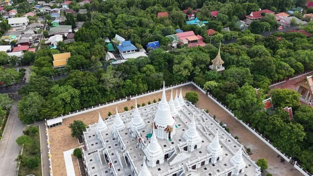 Wat Asokaram. Aerial drone footage of Phra Thutangkha Chedi at Wat Asokaram in Samut Prakan Thailand. Aerial view Thai landmark or travel destination for tourist who seeing Thai architecture culture.