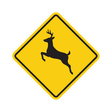 Yellow diamond warning sign with black silhouette of jumping deer