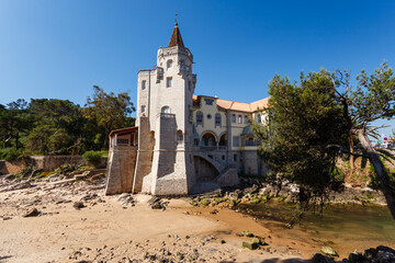 Estoril, Portugal beach with beautiful home with turret and castle tower © Pete Niesen Photo