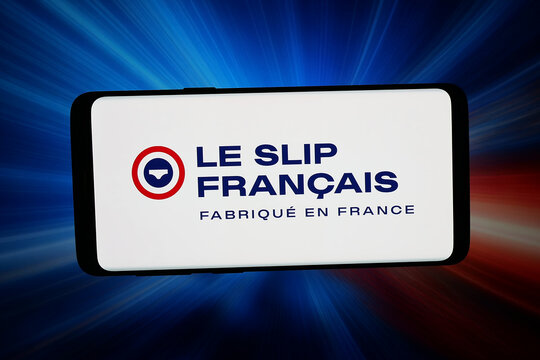 Stuttgart, Germany - 07-10-2026: In this photo illustration, the logo of French clothing company Le Slip Francais is displayed on a smartphone in front of abstract background on computer screen.