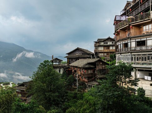 Layered traditional wooden village in Chinese mountains