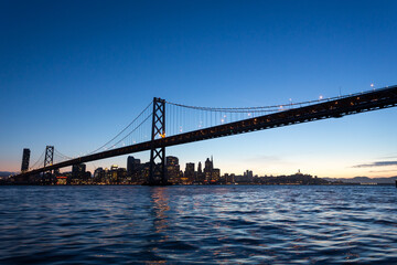 Obraz premium San Francisco Bay Bridge and lights at night
