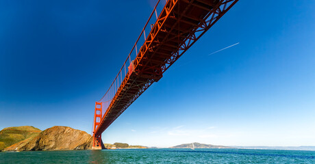 Long span of Golden Gate bridge from below © Pete Niesen Photo