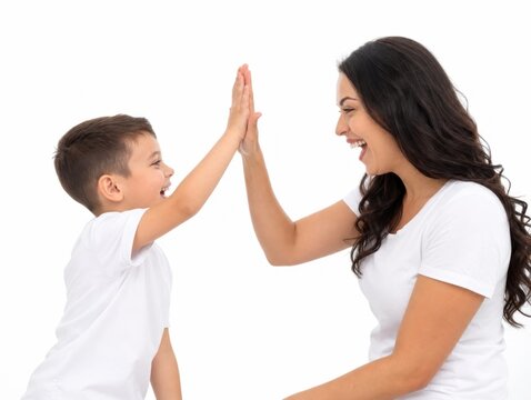 Happy mother and young son giving high five gesture isolated on white background with celebration, interaction