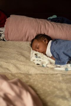Little newborn baby enjoying a peaceful sleep