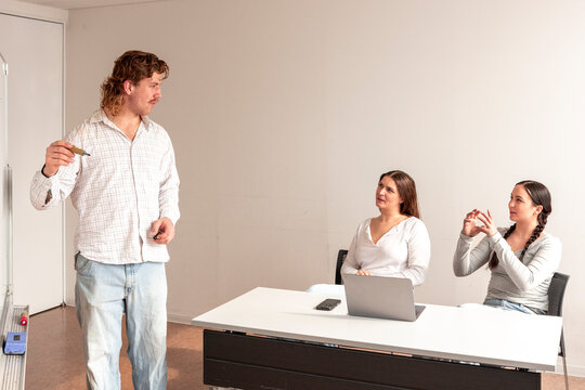 Adult lesson with teacher and engaged classmates