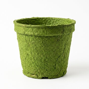 Green Biodegradable Peat Pot for Seedlings and Young Plants Isolated on White Background