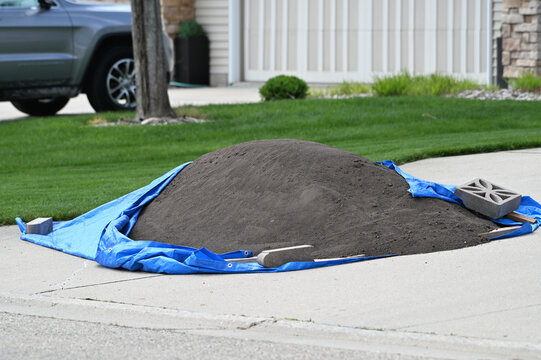 Pile of Dirt on the Driveway