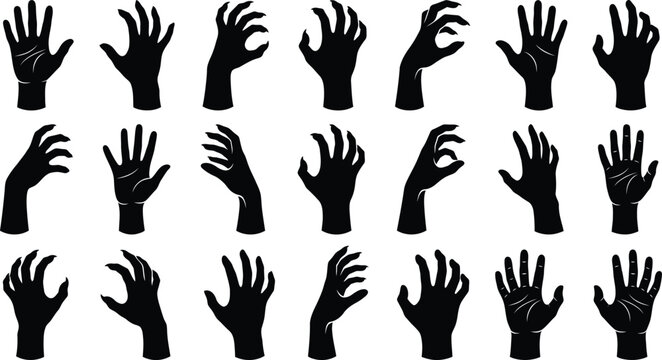 Halloween zombie hands reaching up in the dark spooky night