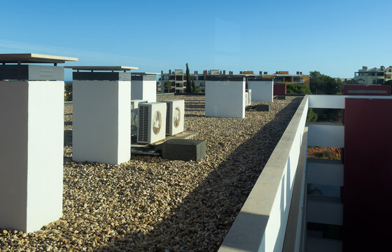 Air conditioning (HVAC) installed on the roof of industrial buildings. Stock Photo