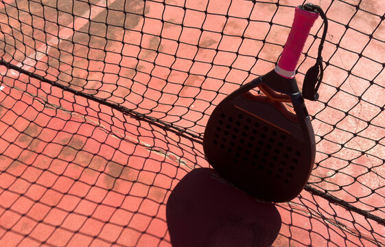 racket for padel on the old court