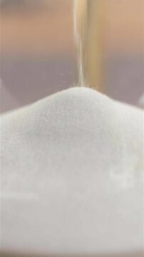 hourglass sands falling macro