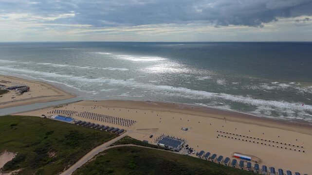 Bright aerial view of Katwijk aan Zee beach and North Sea coastline in the Netherlands
