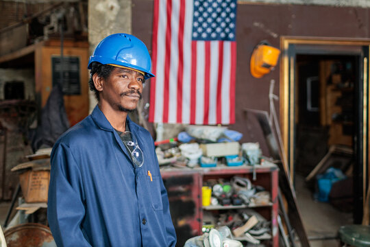Jobless American worker faces uncertainty while waiting for new job opportunities in a workshop setting