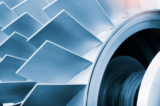 Close-up of metal turbine blades, tech industrial technology background