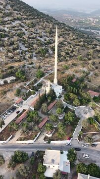 Vertical aerial view of the historical Cave of the Seven Sleepers (Ashab-i Kehf) mosque complex in Tarsus, Turkey.