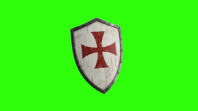 A battle-worn medieval kite shield featuring a red crusader cross rotates in a 3D animated loop. This knight armor asset is isolated on a chroma key green screen.