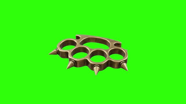 A heavy metal brass knuckle duster with sharp spikes rotates in a 3D animated loop. This weapon asset is isolated on a chroma key green screen.