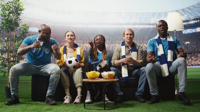 Passionate soccer fans celebrate a goal and enjoy stadium experience at home while football supporters feel thrilled by their favorite team win.